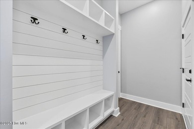 Another exquisitely crafted, custom new construction home by on Brunswick Plantation and Golf Resorts in North Carolina - for sale on GolfHomes.com, golf home, golf lot