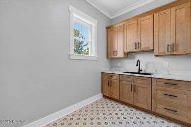 Another exquisitely crafted, custom new construction home by on Brunswick Plantation and Golf Resorts in North Carolina - for sale on GolfHomes.com, golf home, golf lot