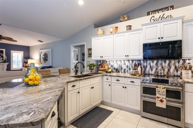 Welcome to this stunning 3-bedroom, 2-full-bath pool home on The Grand Club Cypress Course in Florida - for sale on GolfHomes.com, golf home, golf lot