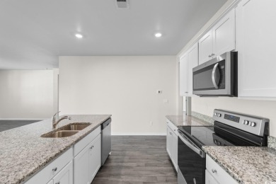 Welcome to 1128 Sennema Circle, where modern comfort meets on Island Green Golf Club in South Carolina - for sale on GolfHomes.com, golf home, golf lot
