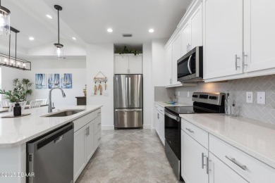 This gorgeous Aloha Cottage is priced to sell with income on LPGA International Golf Course in Florida - for sale on GolfHomes.com, golf home, golf lot