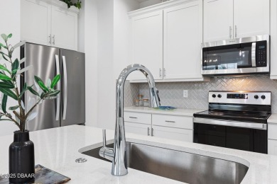 This gorgeous Aloha Cottage is priced to sell with income on LPGA International Golf Course in Florida - for sale on GolfHomes.com, golf home, golf lot