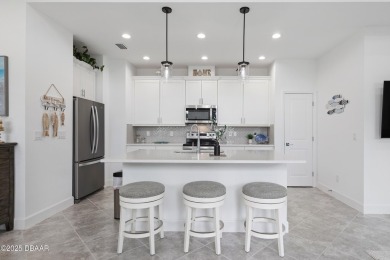 This gorgeous Aloha Cottage is priced to sell with income on LPGA International Golf Course in Florida - for sale on GolfHomes.com, golf home, golf lot