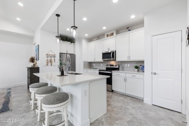 This gorgeous Aloha Cottage is priced to sell with income on LPGA International Golf Course in Florida - for sale on GolfHomes.com, golf home, golf lot