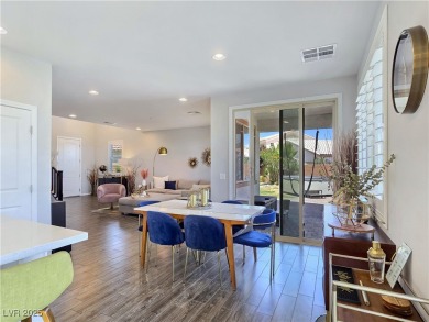 Located in the highly desirable, guard-gated Rhodes Ranch golf on Rhodes Ranch Golf Club in Nevada - for sale on GolfHomes.com, golf home, golf lot