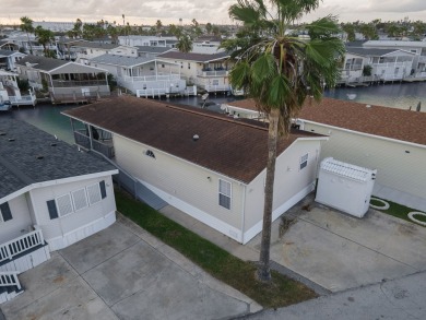 Located in Long Island Village, this 2 bedroom/ 2 bath fully on Long Island Golf Course in Texas - for sale on GolfHomes.com, golf home, golf lot