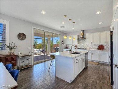 Located in the highly desirable, guard-gated Rhodes Ranch golf on Rhodes Ranch Golf Club in Nevada - for sale on GolfHomes.com, golf home, golf lot
