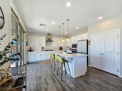 Located in the highly desirable, guard-gated Rhodes Ranch golf on Rhodes Ranch Golf Club in Nevada - for sale on GolfHomes.com, golf home, golf lot