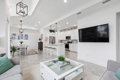 This gorgeous Aloha Cottage is priced to sell with income on LPGA International Golf Course in Florida - for sale on GolfHomes.com, golf home, golf lot