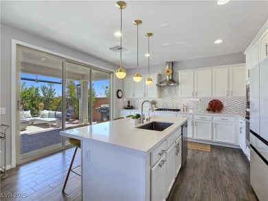 Located in the highly desirable, guard-gated Rhodes Ranch golf on Rhodes Ranch Golf Club in Nevada - for sale on GolfHomes.com, golf home, golf lot