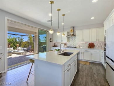 Located in the highly desirable, guard-gated Rhodes Ranch golf on Rhodes Ranch Golf Club in Nevada - for sale on GolfHomes.com, golf home, golf lot