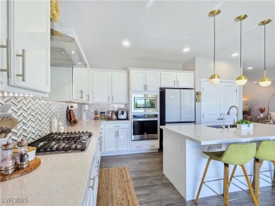 Located in the highly desirable, guard-gated Rhodes Ranch golf on Rhodes Ranch Golf Club in Nevada - for sale on GolfHomes.com, golf home, golf lot