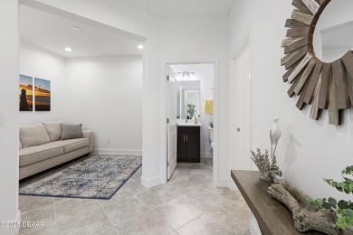 This gorgeous Aloha Cottage is priced to sell with income on LPGA International Golf Course in Florida - for sale on GolfHomes.com, golf home, golf lot