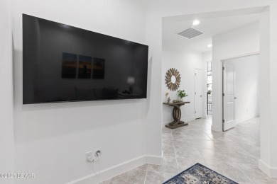 This gorgeous Aloha Cottage is priced to sell with income on LPGA International Golf Course in Florida - for sale on GolfHomes.com, golf home, golf lot