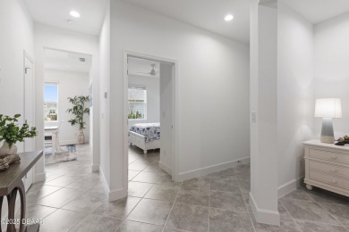 This gorgeous Aloha Cottage is priced to sell with income on LPGA International Golf Course in Florida - for sale on GolfHomes.com, golf home, golf lot
