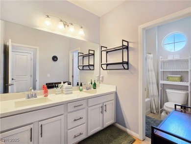 Located in the highly desirable, guard-gated Rhodes Ranch golf on Rhodes Ranch Golf Club in Nevada - for sale on GolfHomes.com, golf home, golf lot