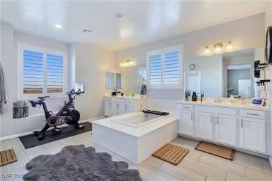 Located in the highly desirable, guard-gated Rhodes Ranch golf on Rhodes Ranch Golf Club in Nevada - for sale on GolfHomes.com, golf home, golf lot
