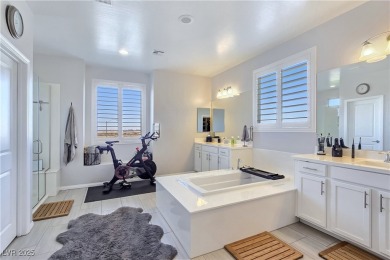 Located in the highly desirable, guard-gated Rhodes Ranch golf on Rhodes Ranch Golf Club in Nevada - for sale on GolfHomes.com, golf home, golf lot