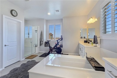 Located in the highly desirable, guard-gated Rhodes Ranch golf on Rhodes Ranch Golf Club in Nevada - for sale on GolfHomes.com, golf home, golf lot
