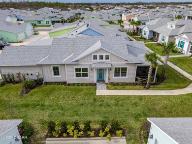 This gorgeous Aloha Cottage is priced to sell with income on LPGA International Golf Course in Florida - for sale on GolfHomes.com, golf home, golf lot