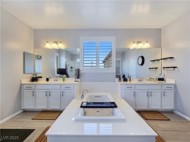 Located in the highly desirable, guard-gated Rhodes Ranch golf on Rhodes Ranch Golf Club in Nevada - for sale on GolfHomes.com, golf home, golf lot