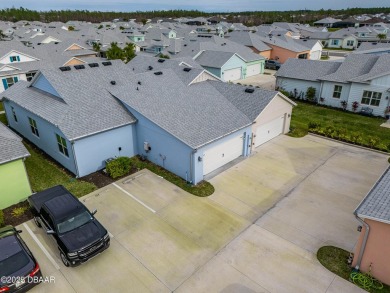 This gorgeous Aloha Cottage is priced to sell with income on LPGA International Golf Course in Florida - for sale on GolfHomes.com, golf home, golf lot