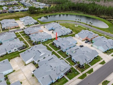 This gorgeous Aloha Cottage is priced to sell with income on LPGA International Golf Course in Florida - for sale on GolfHomes.com, golf home, golf lot