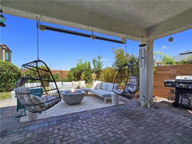 Located in the highly desirable, guard-gated Rhodes Ranch golf on Rhodes Ranch Golf Club in Nevada - for sale on GolfHomes.com, golf home, golf lot