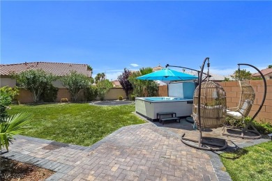 Located in the highly desirable, guard-gated Rhodes Ranch golf on Rhodes Ranch Golf Club in Nevada - for sale on GolfHomes.com, golf home, golf lot