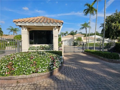 Stunning courtyard home overlooking golf course with lush on Club at Pelican Bay Golf Course in Florida - for sale on GolfHomes.com, golf home, golf lot