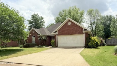 A charming abode at 131 St. James: located in the highly on Grenada Country Club in Mississippi - for sale on GolfHomes.com, golf home, golf lot