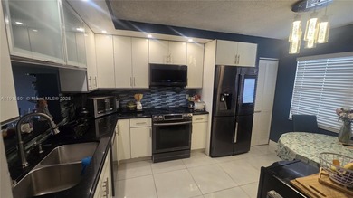 This beautifully remodeled 2/2 unit has a gorgeous view. This on Flamingo Lakes Country Club in Florida - for sale on GolfHomes.com, golf home, golf lot