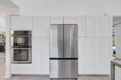 Step inside this beautifully renovated 3 bedroom, 2.5 bath home on  in Florida - for sale on GolfHomes.com, golf home, golf lot