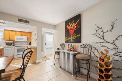 Imagine a home that blends comfort, convenience, and the best of on Saint Andrews South Golf Club in Florida - for sale on GolfHomes.com, golf home, golf lot