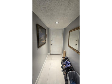 This beautifully remodeled 2/2 unit has a gorgeous view. This on Flamingo Lakes Country Club in Florida - for sale on GolfHomes.com, golf home, golf lot