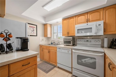 Imagine a home that blends comfort, convenience, and the best of on Saint Andrews South Golf Club in Florida - for sale on GolfHomes.com, golf home, golf lot