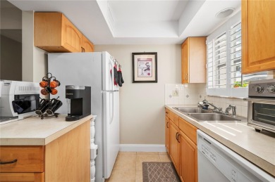 Imagine a home that blends comfort, convenience, and the best of on Saint Andrews South Golf Club in Florida - for sale on GolfHomes.com, golf home, golf lot