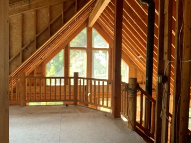 Explore the allure of log cabin living in this charming home on Meadowcreek Golf Resort in Idaho - for sale on GolfHomes.com, golf home, golf lot