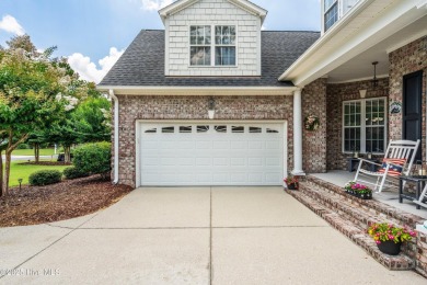 This charming, well maintained 4BR/3BA is located on a quiet on Carolina National Golf Club in North Carolina - for sale on GolfHomes.com, golf home, golf lot