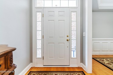 This charming, well maintained 4BR/3BA is located on a quiet on Carolina National Golf Club in North Carolina - for sale on GolfHomes.com, golf home, golf lot