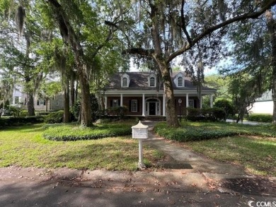 Welcome to classic Lowcountry living in the prestigious gated on Pawleys Plantation Golf and Country Club in South Carolina - for sale on GolfHomes.com, golf home, golf lot