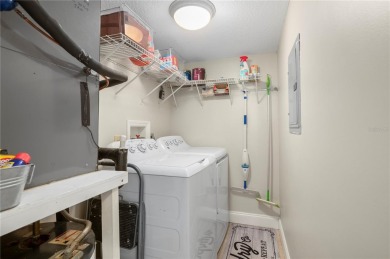 Imagine a home that blends comfort, convenience, and the best of on Saint Andrews South Golf Club in Florida - for sale on GolfHomes.com, golf home, golf lot