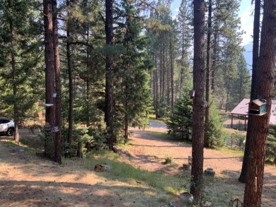 Explore the allure of log cabin living in this charming home on Meadowcreek Golf Resort in Idaho - for sale on GolfHomes.com, golf home, golf lot