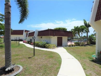 Imagine a home that blends comfort, convenience, and the best of on Saint Andrews South Golf Club in Florida - for sale on GolfHomes.com, golf home, golf lot