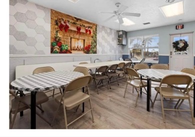 Imagine a home that blends comfort, convenience, and the best of on Saint Andrews South Golf Club in Florida - for sale on GolfHomes.com, golf home, golf lot