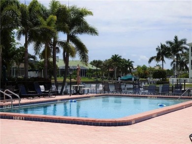 Imagine a home that blends comfort, convenience, and the best of on Saint Andrews South Golf Club in Florida - for sale on GolfHomes.com, golf home, golf lot