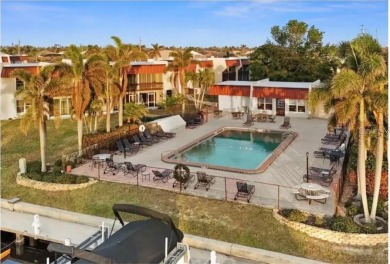Imagine a home that blends comfort, convenience, and the best of on Saint Andrews South Golf Club in Florida - for sale on GolfHomes.com, golf home, golf lot