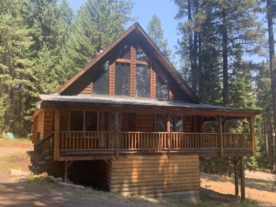 Explore the allure of log cabin living in this charming home on Meadowcreek Golf Resort in Idaho - for sale on GolfHomes.com, golf home, golf lot