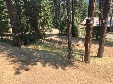 Explore the allure of log cabin living in this charming home on Meadowcreek Golf Resort in Idaho - for sale on GolfHomes.com, golf home, golf lot