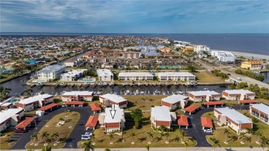 Imagine a home that blends comfort, convenience, and the best of on Saint Andrews South Golf Club in Florida - for sale on GolfHomes.com, golf home, golf lot